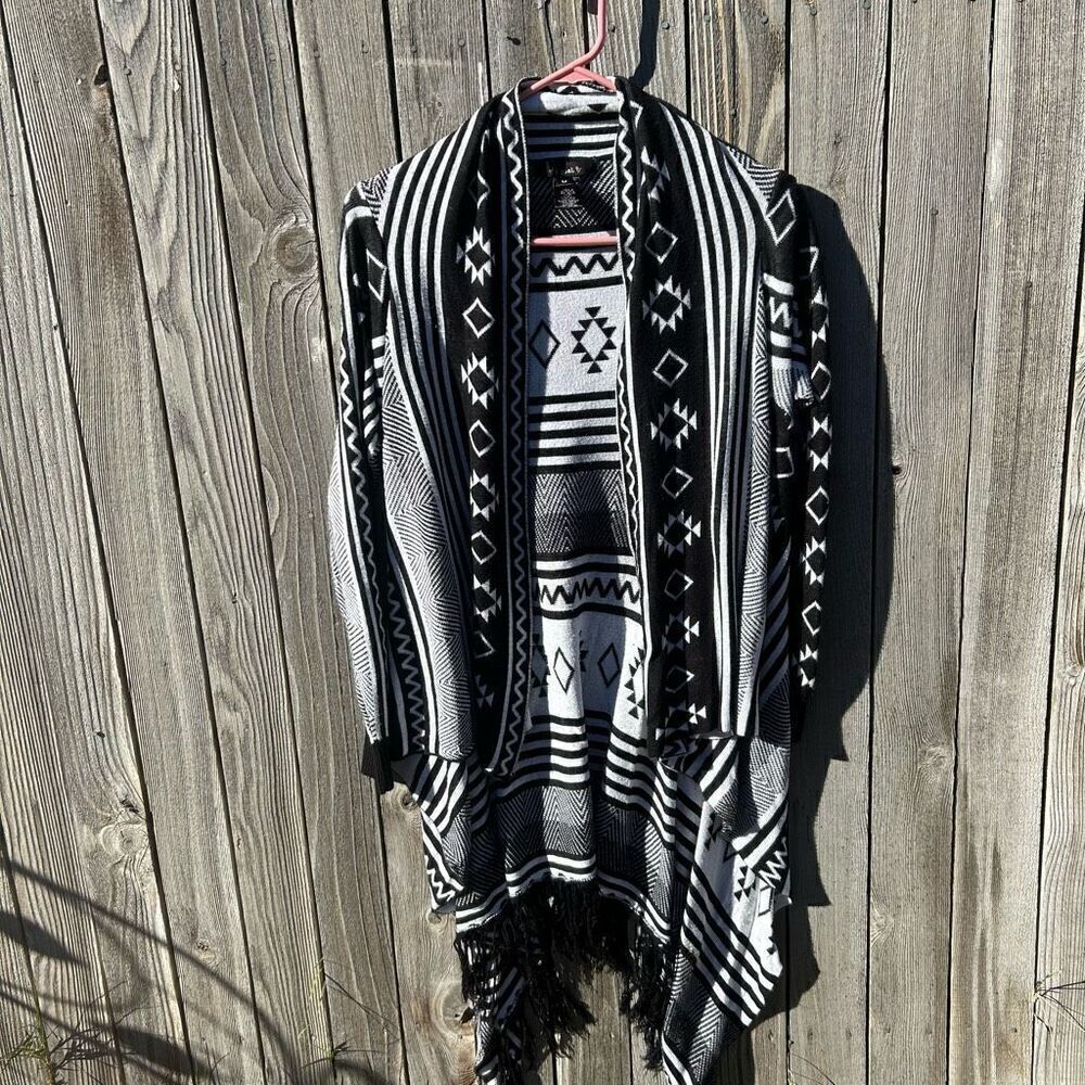I Joal cardigan waterfall sides and fringed bottom. Size medim